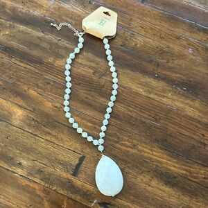 Elegant White Beaded Necklace with Teardrop Pendant